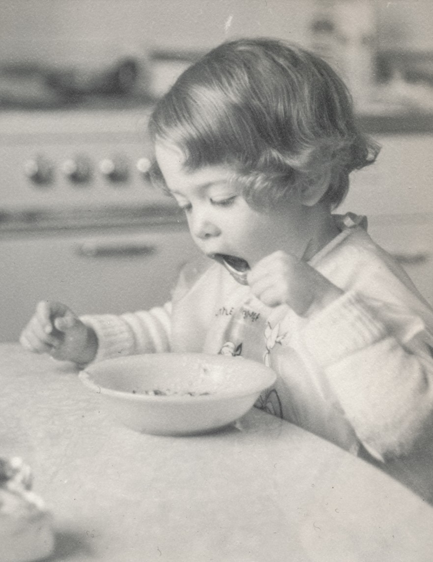 Little girl eating cereal