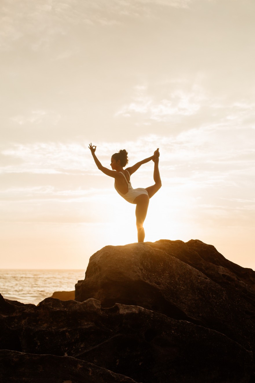 woman-in-white-one-piece-swimsuit-doing-yoga-3317185