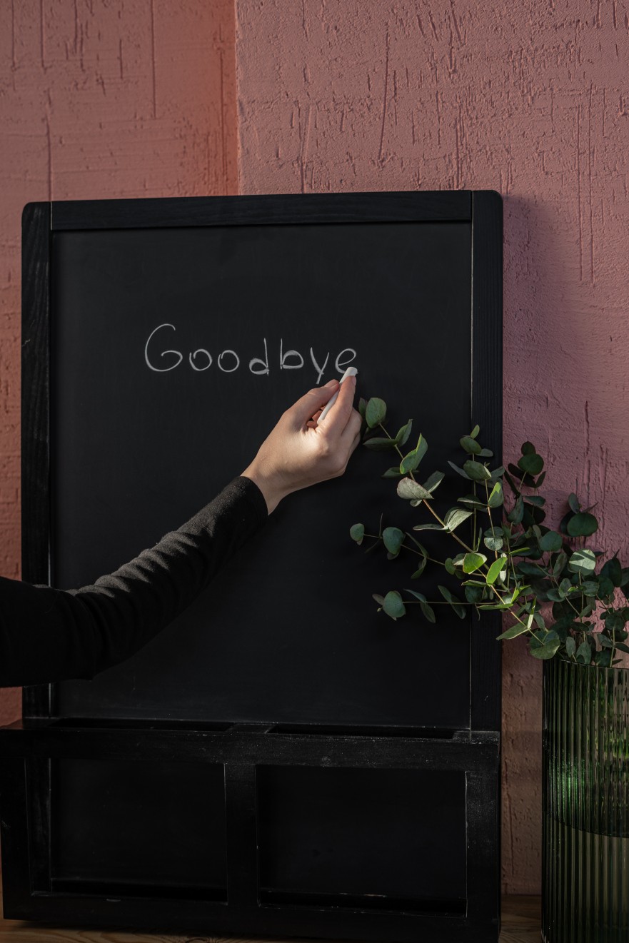 Canva - Person Writing on Black Board with Chalk